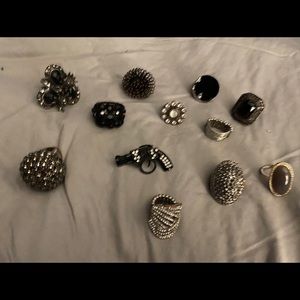 Lot of 12 fashion rings, one size fits all. Good